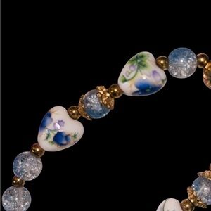 Elegant Gold and Blue Heart Charm Bracelet